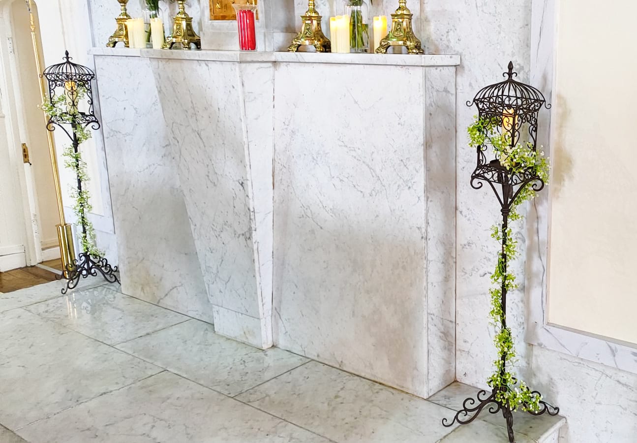 Tall antique candle holders with gyp garlands